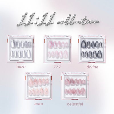 The "11:11 Collection Vol. 1" by Glowie By Her, now 20% off, features five striking artificial nail sets—Haze, 777, Divine, Aura, and Celestial. These cat eye chrome designs gleam in silver, pink, and glitter within transparent boxes against a light background.